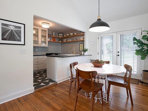 Dining area with French doors leading to backyard