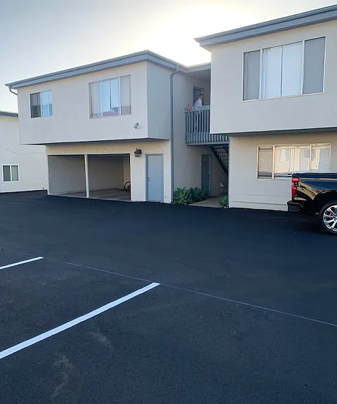 reserved parking spots in the back of building