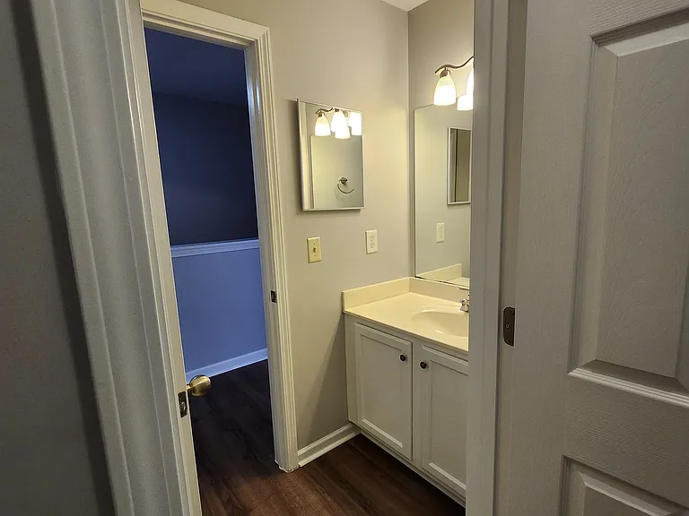 Bathroom access from hallway and bedroom one