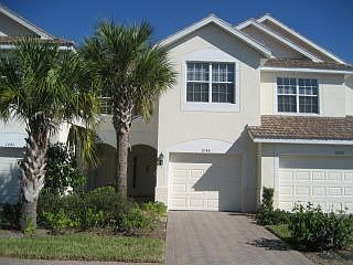 Exterior, Tile Roof, Brick Paver Entry