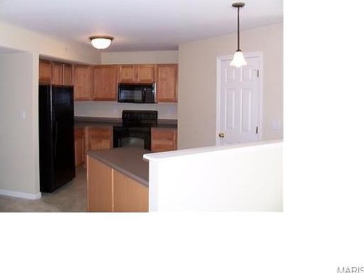 Fully equipped kitchen, including referigerator, microwave and main floor laundry with waher and dry