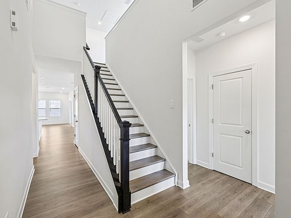 Step inside the 4-bed, 3.5-bath Carolina Side Load floorplan.