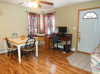 The eating area is spacious with room for almost any sized table.