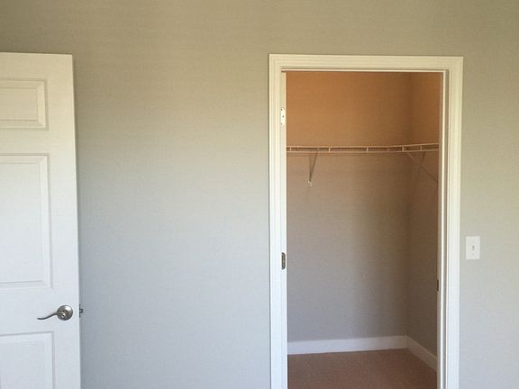 Huge walk-in closet in bedroom