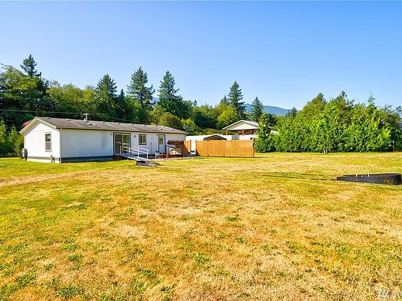 Wheelchair access in back of home. Horseshoe pit and large patio. 
