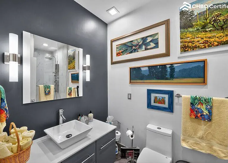 Van Gogh Suite bath with gallery of original oil paintings