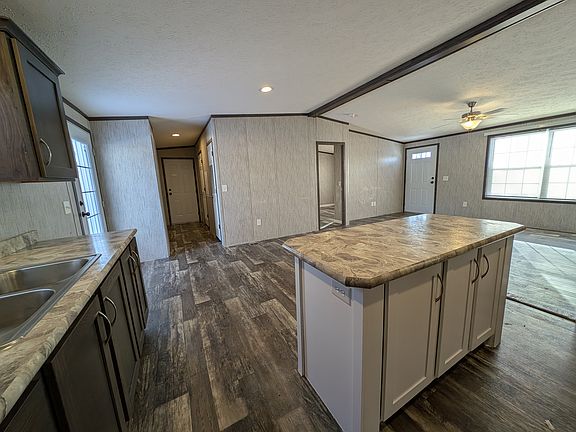 View from kitchen into open concept living area.