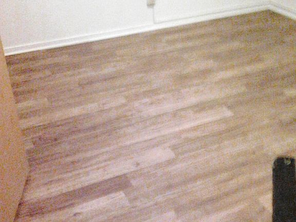 New floor in bedroom.