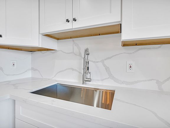 ALL NEW CABINETS & SINK/FAUCET
