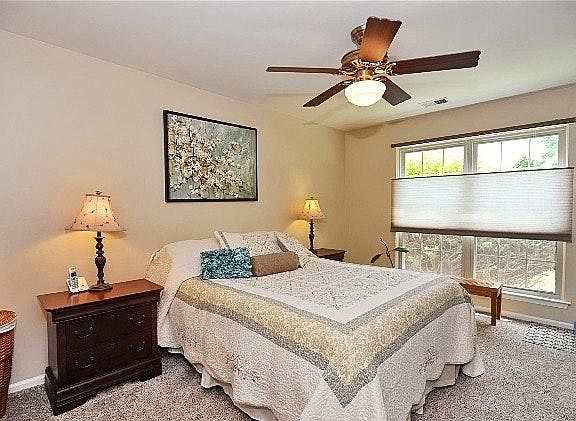 Master bedroom with ceiling fan