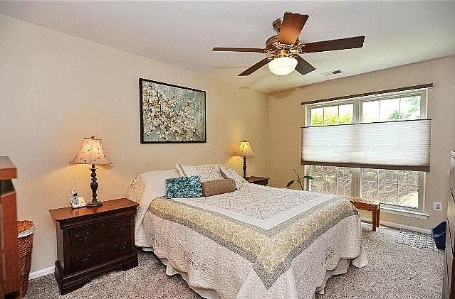 Master bedroom with ceiling fan