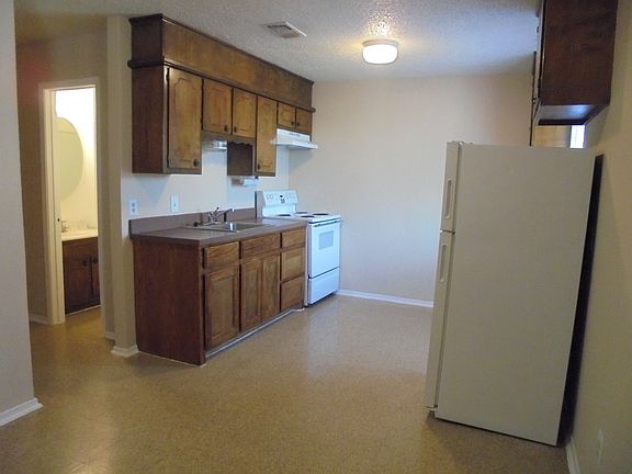 KITCHEN VIEW/HALL BATH ENTRANCE