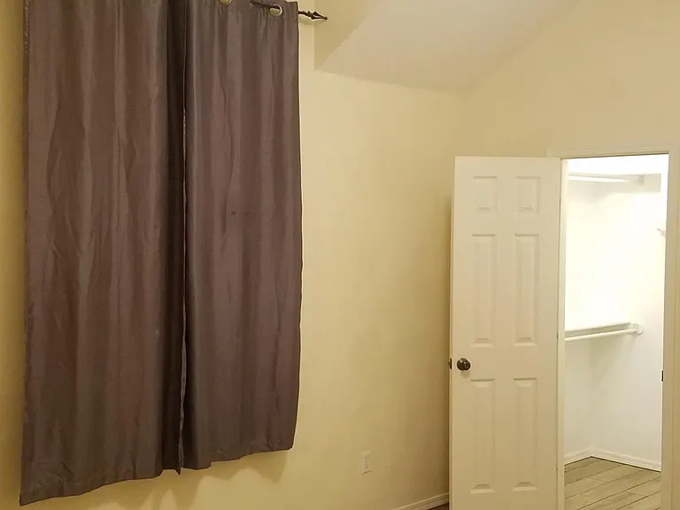 Another bedroom with walk-in closet