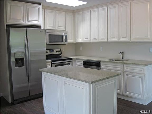 All New Kitchen with Quartz Counter-tops, Stainless Steel Applia