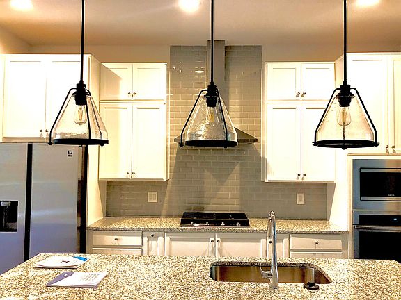 kitchen has upgraded light fixtures