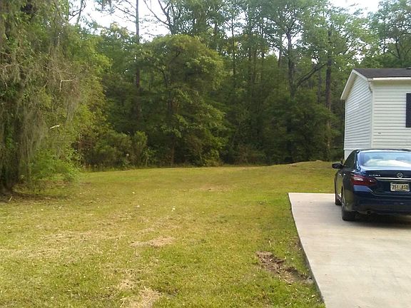 Concrete driveway/sidewalk.