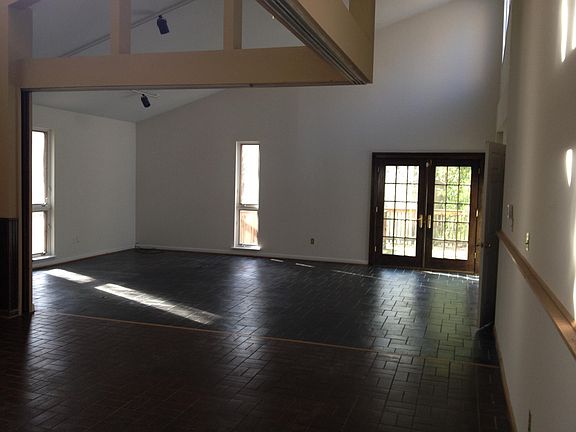 Living room with entrance to deck