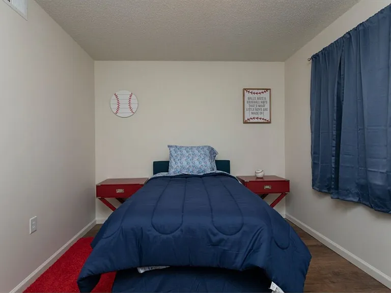 Whispering Woods Apartments — Photo 9