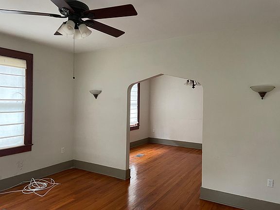 Arched opening in wall that separates the first room from the second room