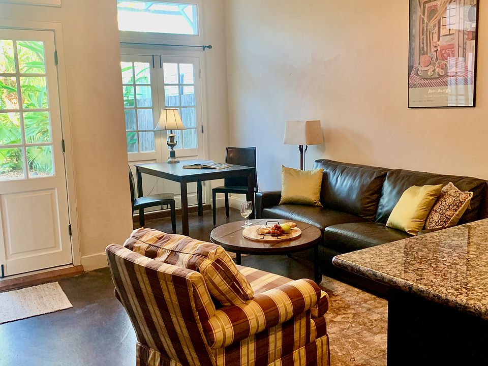 Living area and Bar open to deluxe kitchen and to Patio garden