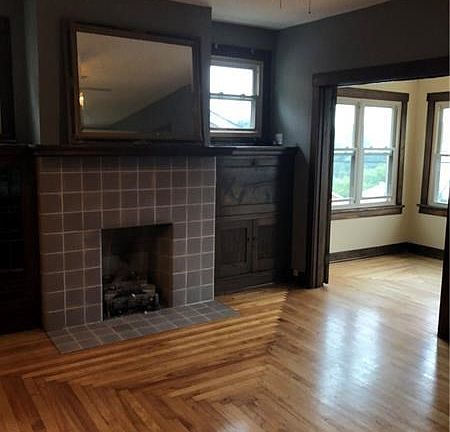 The 1st floor office area is in view to the right, accessed through french doors.
