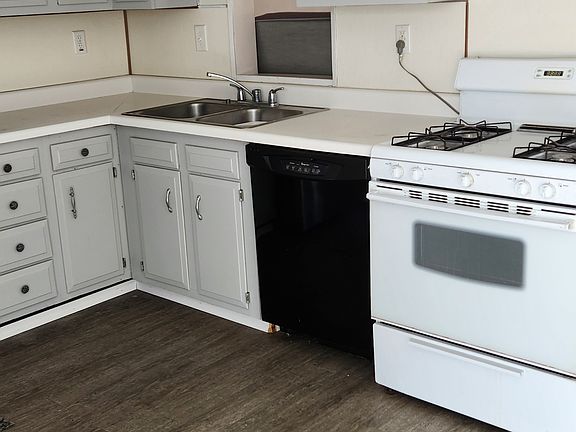 kitchen with stove and dishwasher