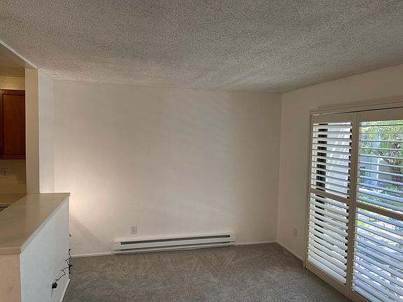 Living room with plantation shutters.