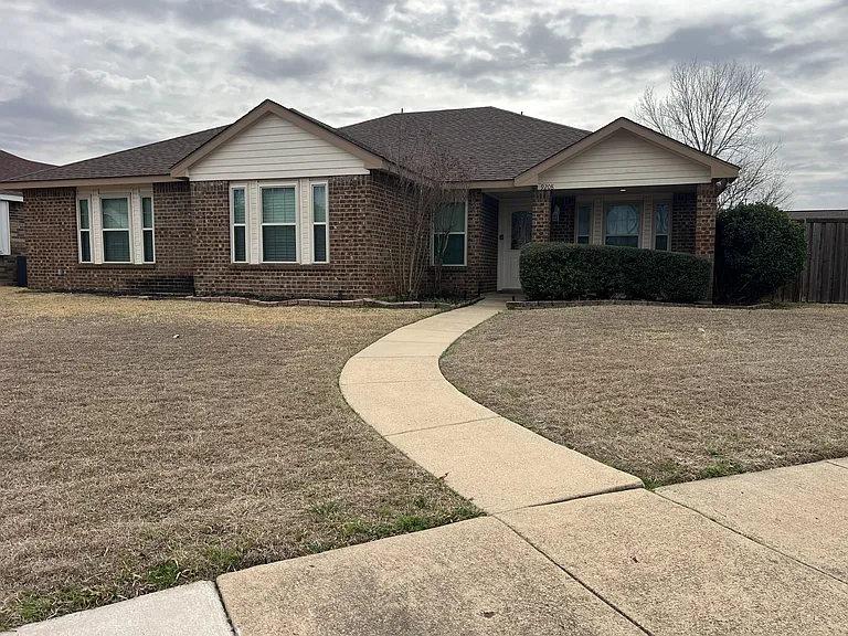 Welcome home to this beautifully maintained fully furnished brick residence in Rowlett.