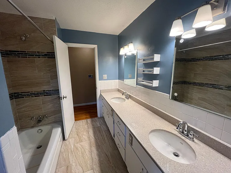 Freshly updated tile shower