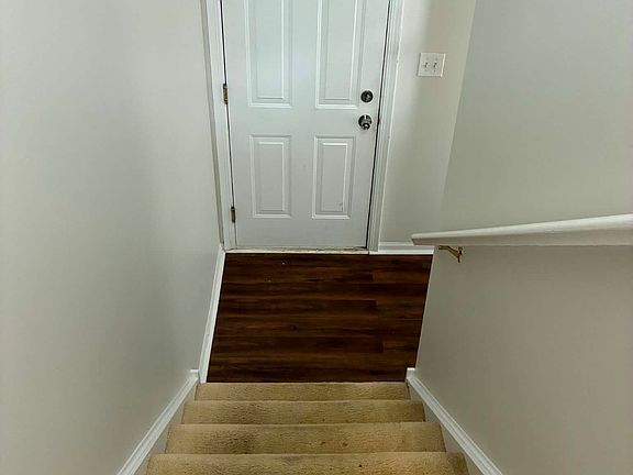 front door, stairs to 1st floor