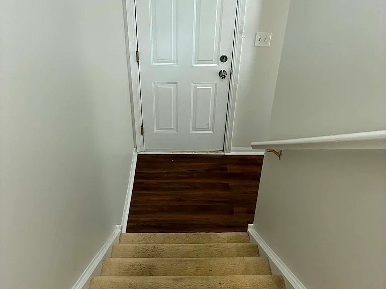 front door, stairs to 1st floor
