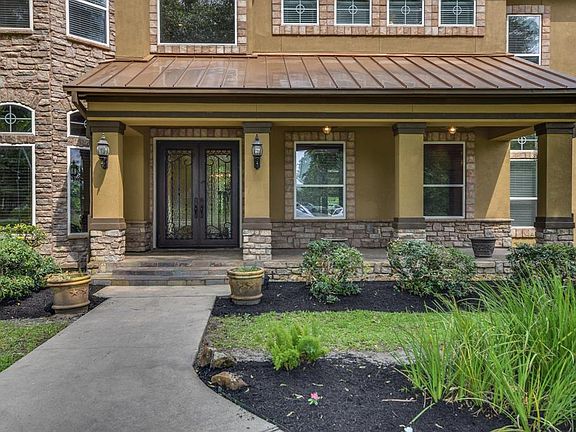 This stunning 6,349 Sq.Ft custom home offers recent outside paint, double doors and large front porch. The roof was replaced in 2019 with a 50 Year Shingle.