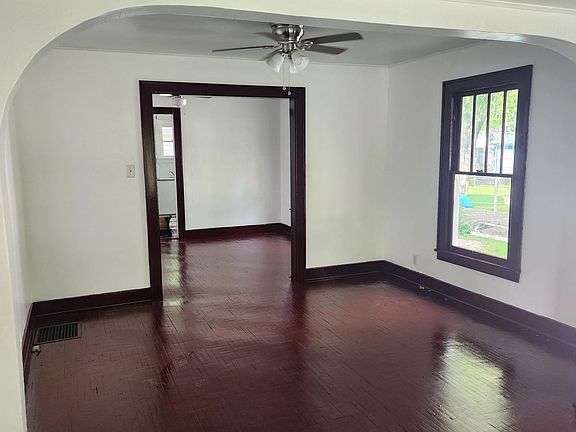 Main entrance, opens into living room, followed by dining room, then the kitchen. Newly refinished painted walls and ceiling, floors and trim newly refinished sanded and stained.