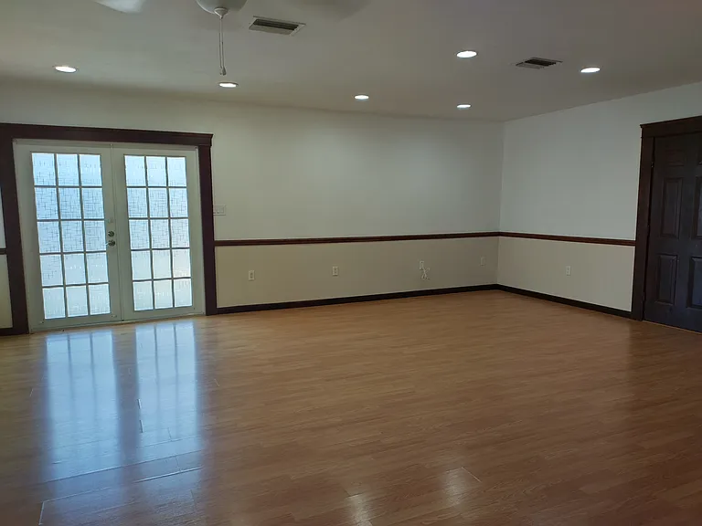 Main living area looking toward front door.