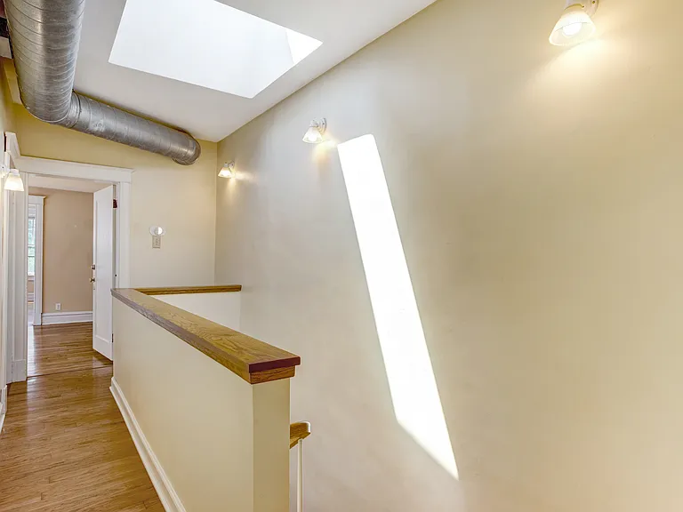 Second floor hall with skylight