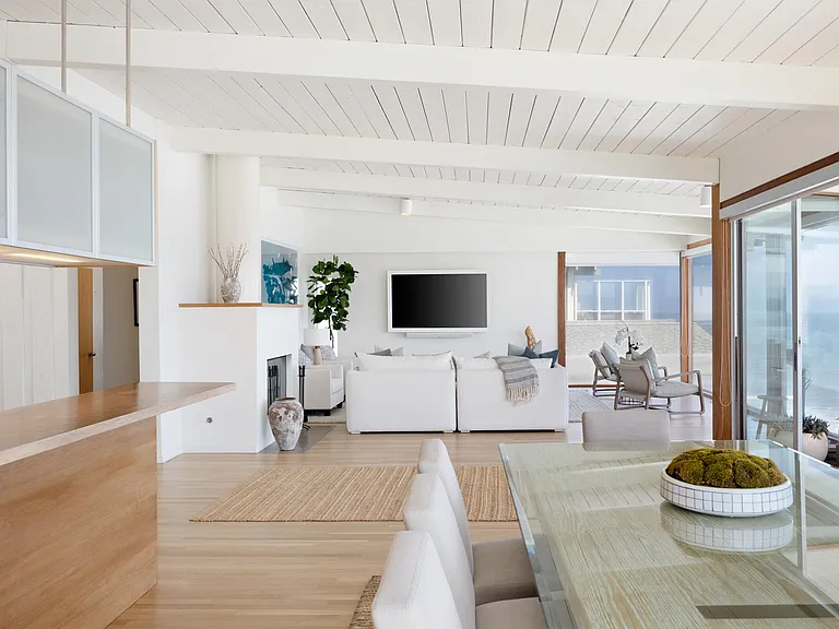 The open floor plan makes going from the dining room to the family room easy.