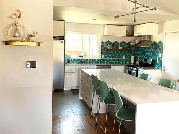 11 foot quartz island / dining + kitchen