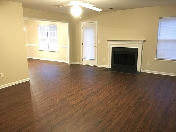 Living Room w/ Real Wood Burning Fireplace