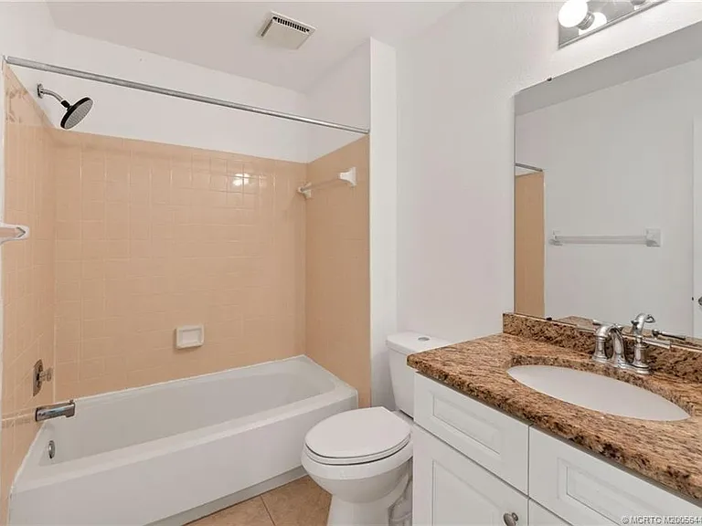 1496 SE Colchester Cir — Photo 16