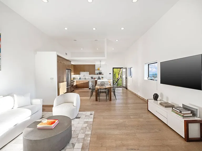 Escape to the refined luxury of Guest Bedroom #3's living area, a space designed for relaxation and indulgence.