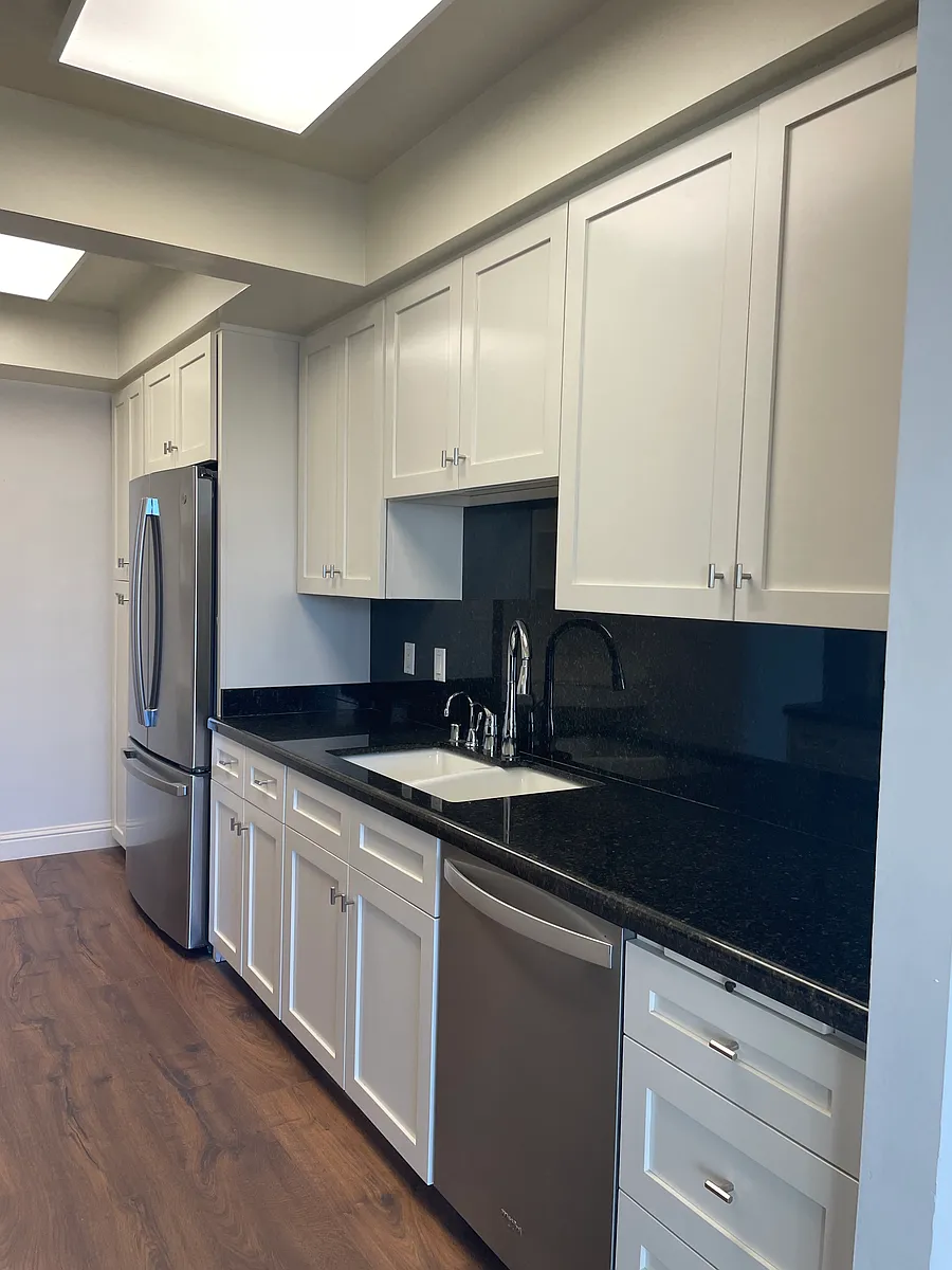 Kitchen from living room view - 555 Laurel Ave #505