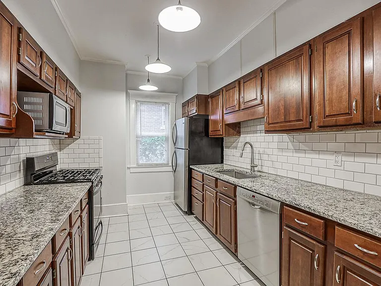 Updated kitchen with SS appliances and tons of cabinet space