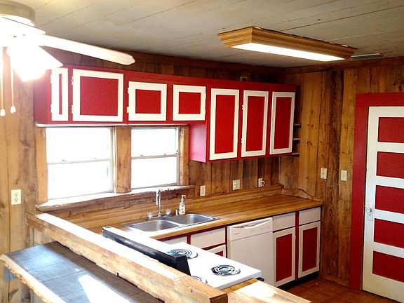 Kitchen. Pantry. Indirect lighting above and below cabinets.