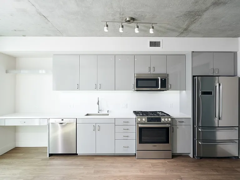 Choose your cabinet color schemes from: grey lacquer cabinets or dark wood cabinets