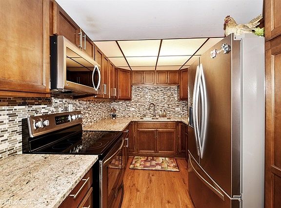 4th image of 5540 Walnut Ave APT 14C