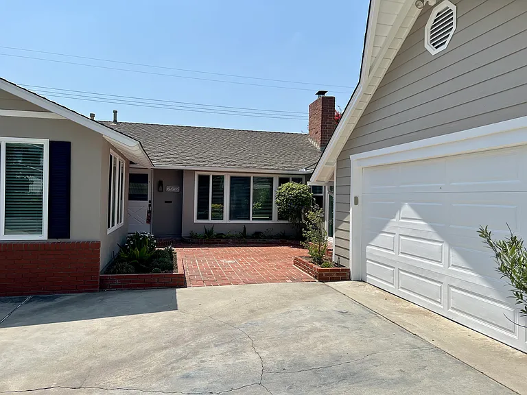 Entryway patio, driveway, garage