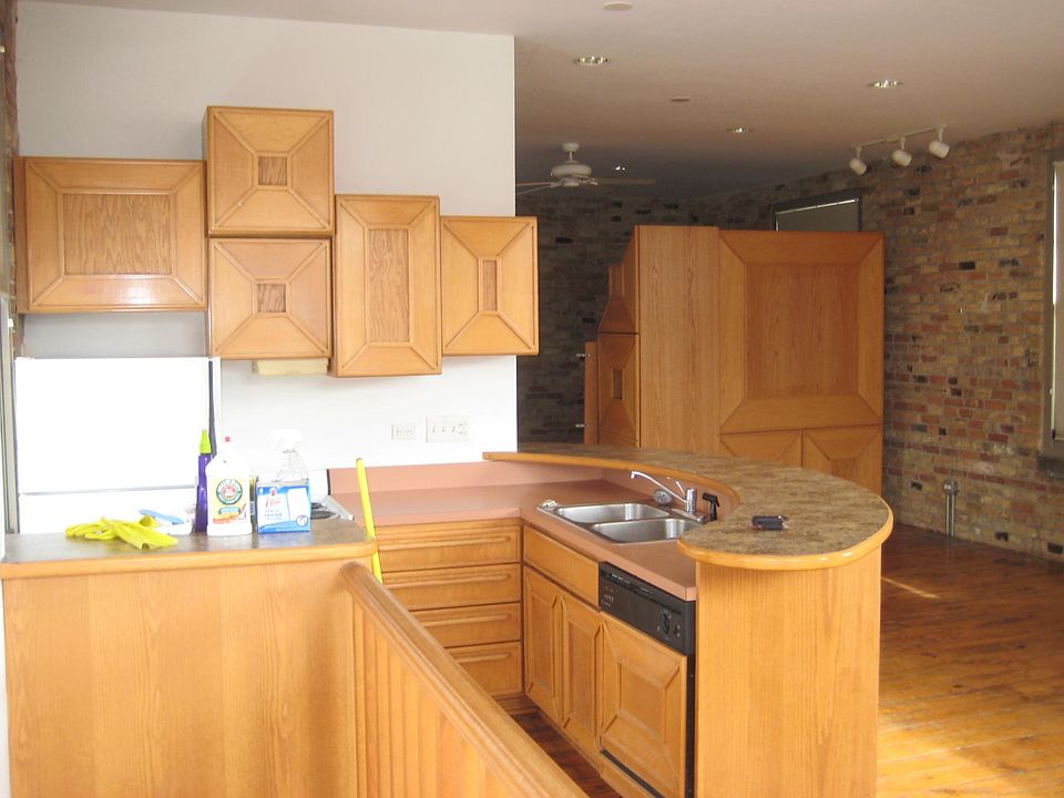Kitchen, Custom Closet and Dresser unit in background