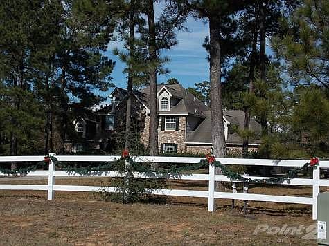 House on the left of the property