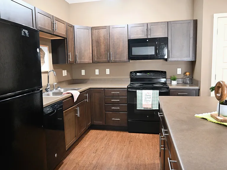 A modern kitchen in a unit at The Sterling
