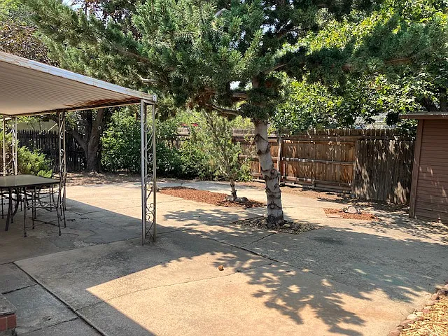 Back yard, covered patio, storage shed, private fenced, low maintenance